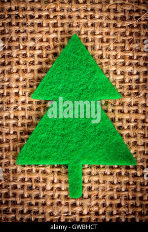 L'impression des décorations de Noël sur fond de jute. Banque D'Images