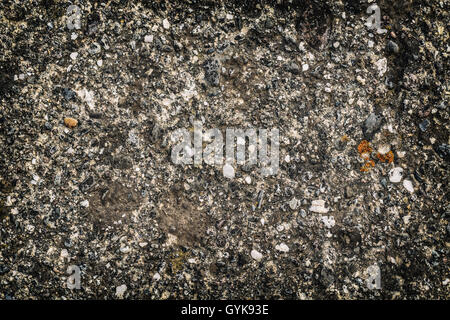 La texture de la surface en béton, des pierres et de gravier, de petites pierres dans le béton Banque D'Images