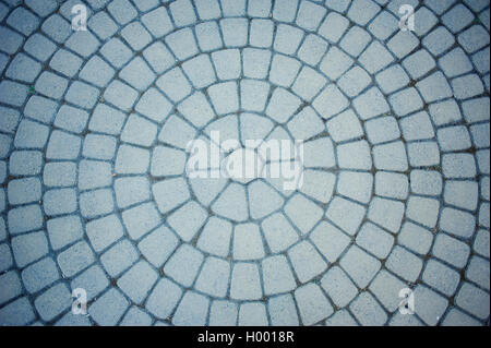 Chaussée pavée de pierre dans un cercle. Le gris, vieille ville Banque D'Images
