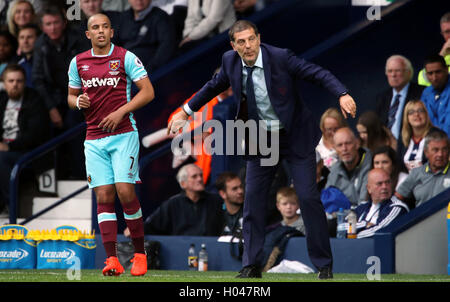 West Ham United's Sofiane Feghouli et West Ham United manager Slaven Bilic Banque D'Images