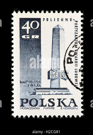 Timbre-poste de la Pologne représentant le mémorial de guérilla dans Plichno. Banque D'Images