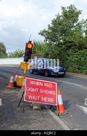 Feux de circulation temporaire sur la route Banque D'Images