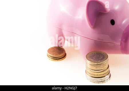 Cochon rose avec coins Banque D'Images