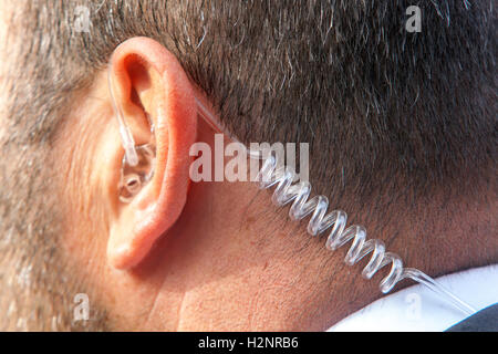 Détail de l'écouteur, garde du corps, agent de sécurité de l'oreille Banque D'Images