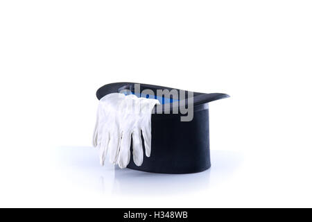 Magicien noir top hat avec une paire de gants blancs Banque D'Images