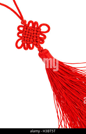 Close up of bright Red Knot éternelle tassel isoler sur blanc. Banque D'Images
