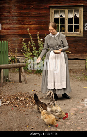 La représentation des scènes de la vie quotidienne des 'vieux' de la Suède en plein air Skansen, l'île de Djurgarden, Stockholm, Suède Banque D'Images