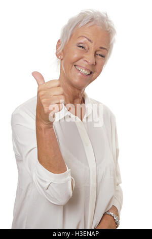 Mature Woman giving Thumbs up Banque D'Images