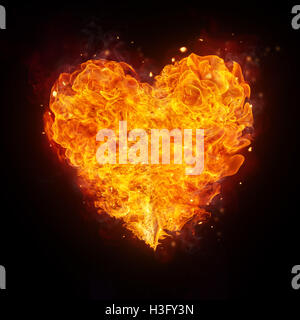 Forme de coeur feu isolé sur fond noir Banque D'Images