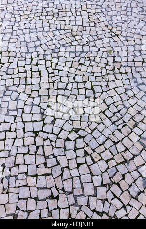 Détails de sol en mosaïque typique sur les rues de Lisbonne, Portugal Banque D'Images