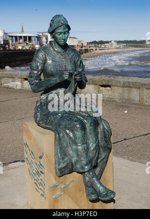 Le Gansey fille sur la jetée nord de Bridlington. Banque D'Images