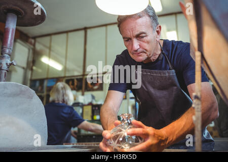 Travailler sur un souffleur de verre Banque D'Images
