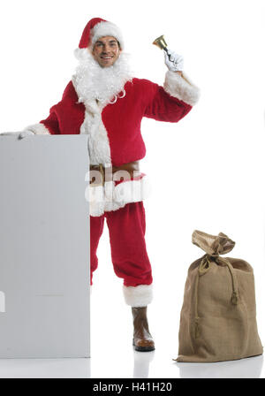 Noël, Santa, pochette, Bell, signe blanc, présent de Noël, yule marée, x-mas, l'homme, jeunes, stand, coiffures, cap, Santa's hat, a fait cap, rouge, doublure, costume, pour Noël, le costume du Père Noël, la barbe, la barbe, l'ivresse, Père Noël, Santa Claus, annoncer, Banque D'Images