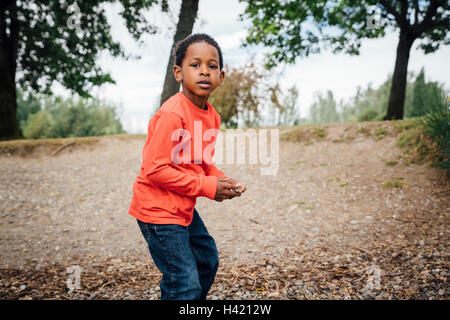 Black Boy holding stone Banque D'Images