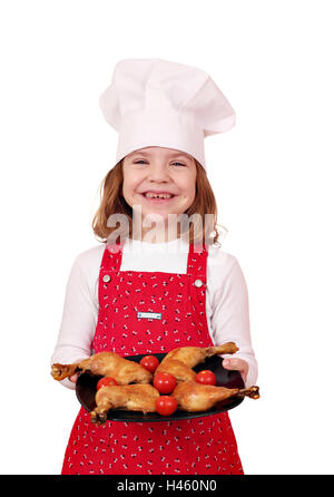 Happy little girl cook avec pilons de poulet Banque D'Images