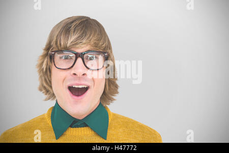 Composite image of businessman hipster surpris Banque D'Images