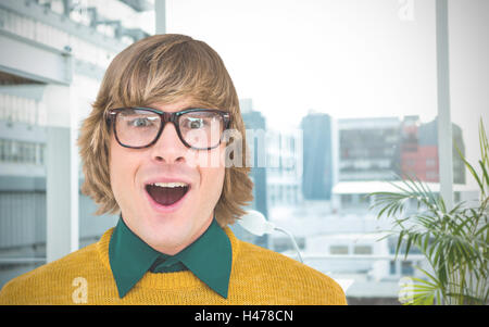 Composite image of businessman hipster surpris Banque D'Images