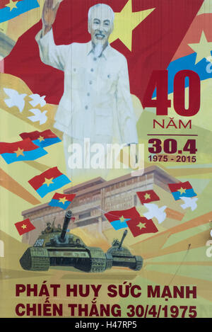 La propagande de rue affiche célébrant 40 ans de l'unification et l'indépendance du Vietnam, Ho Chi Minh Ville, Viet Nam Banque D'Images