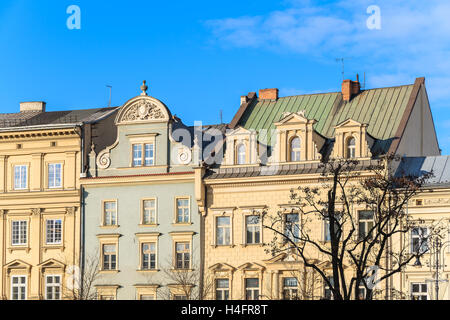 Les maisons de ville sur la place du marché principale de Cracovie, Pologne ville Banque D'Images