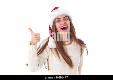 Woman in red christmas hat showing thumb up Banque D'Images