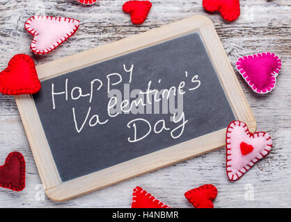 Happy Valentine's Day. Message manuscrit sur une ardoise Banque D'Images