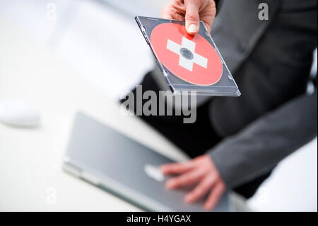 CD avec un drapeau suisse Banque D'Images