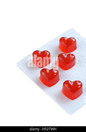Jelly sous forme de coeur rouge isolé. Banque D'Images