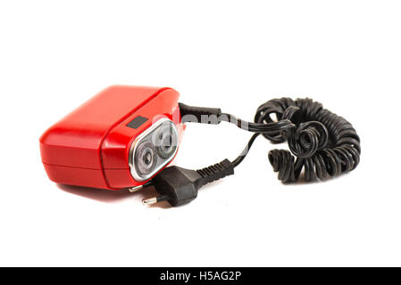Rasoir rasoir électrique vintage rouge sur fond blanc Banque D'Images
