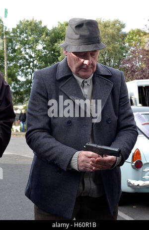Acteur irlandais Gerard McSorley sur le plateau, à Londonderry, du Tom Collins film la pénitence. Banque D'Images