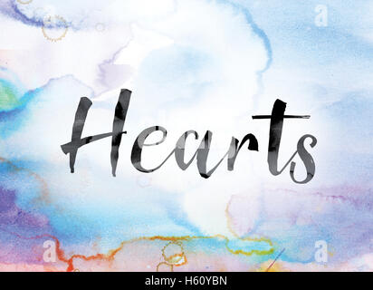 Le mot 'coeur' peint à l'encre noire sur un arrière-plan coloré aquarelle lavé concept et thème. Banque D'Images