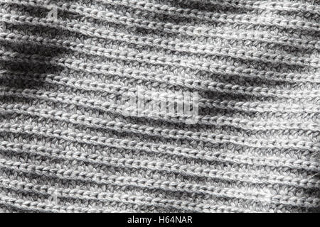 Close up detail des étoffes de laine. La laine tricot gris texture background. Banque D'Images
