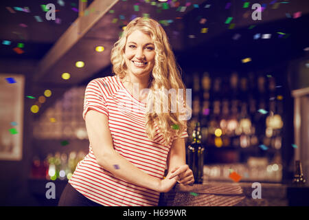 Composite image of smiling blonde woman Banque D'Images