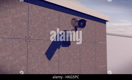 Le rendu 3D de la caméra de vidéosurveillance d'argent sur le mur Banque D'Images
