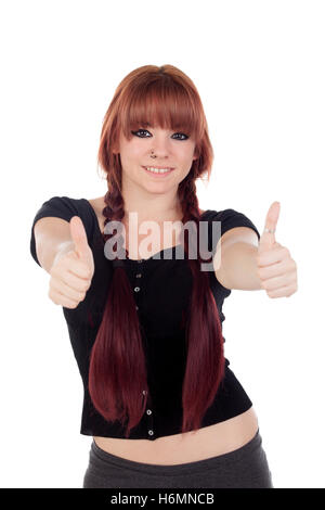 Teenage girl habillé en noir avec un piercing dit ok dans le nez qui indique quelque chose d'isolé sur fond blanc Banque D'Images