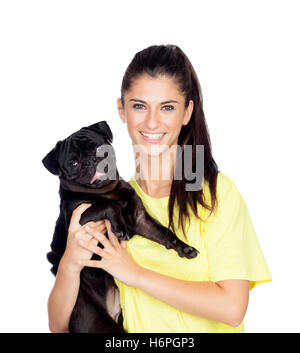Fille brune avec son chien pug isolé sur fond blanc Banque D'Images