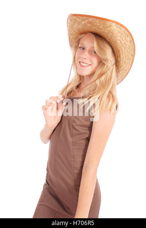 Jolies jeunes filles de 13 ans portant un grand chapeau de paille disquette isolated on white Banque D'Images