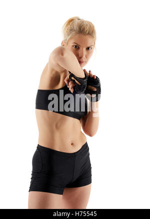 MMA fighter femme jetant un coude, isolated on white Banque D'Images