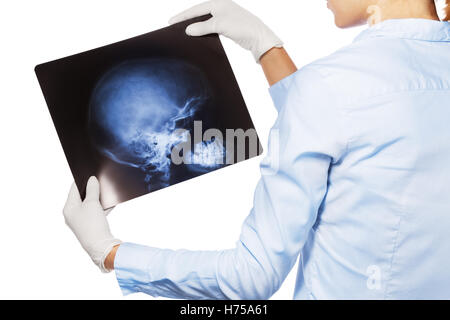 Médecin à la tête du patient à xray scull Banque D'Images