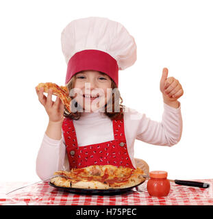 Happy little girl cook manger une pizza Banque D'Images