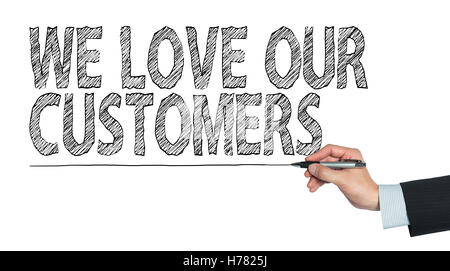 Nous aimons nos clients écrit à la main, la main sur la photo, transparent Banque D'Images