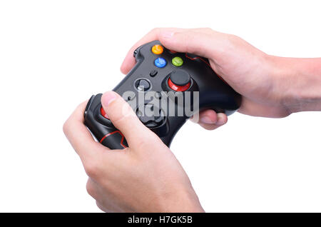 Console de jeux vidéo contrôleur dans les mains de joueur isolé sur fond blanc Banque D'Images