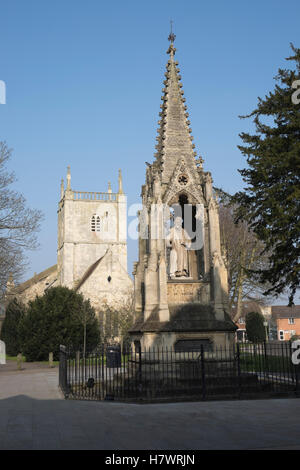 Soleil du printemps sur l'église St Mary de Lode et évêque Hooper's monument à Gloucester Banque D'Images