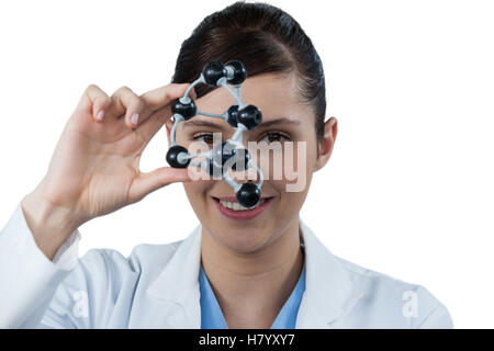 Portrait of female scientist holding molecular model Banque D'Images