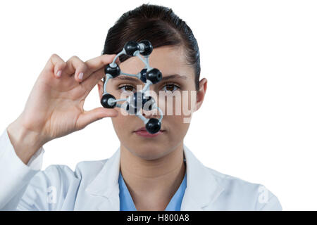 Portrait of female scientist holding molecular model Banque D'Images