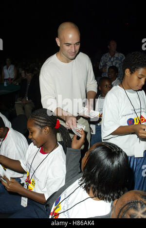 ANDRE AGASSI ET ENFANTS 7ÈME ANDRE AGSSAI GRAND SLAM MGM Grand Garden Arena de LAS VEGAS MGM GRAND HOTEL US 28 Septembre 2002 Banque D'Images