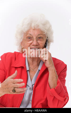 Senior woman with mobile phone Banque D'Images