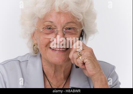 Senior woman with mobile phone Banque D'Images