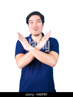 Jeune homme asiatique pompée, faisant signe X forme avec ses bras et ses mains, ses bras et mains, dire non, isolé sur blanc retour Banque D'Images