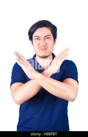 Jeune homme asiatique pompée, faisant signe X forme avec ses bras et ses mains, ses bras et mains, dire non, isolé sur blanc retour Banque D'Images