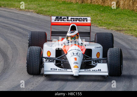 1991 McLaren-Honda MP4/6 avec chauffeur Stoffel Vandoorne au Goodwood Festival of Speed 2016, Sussex, UK. Banque D'Images